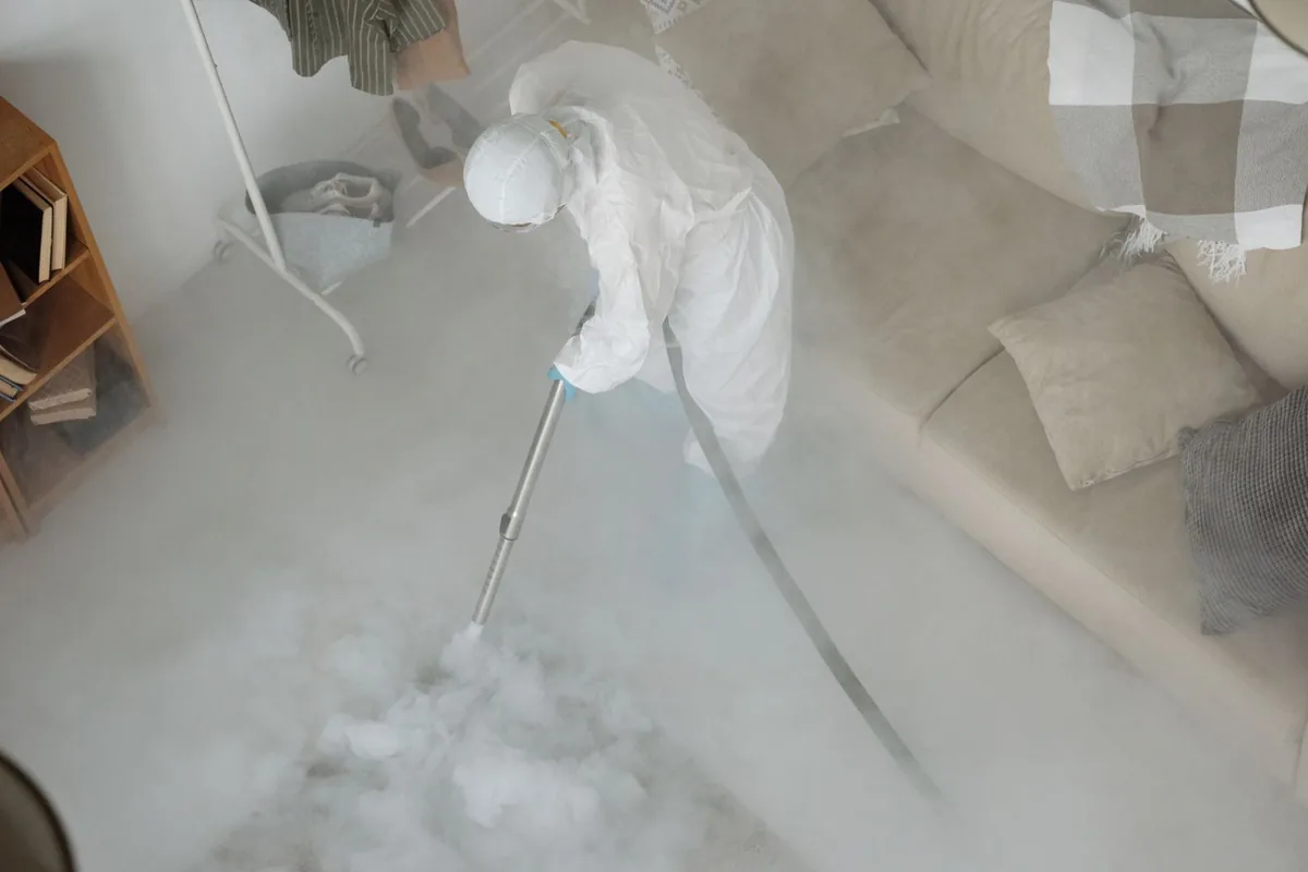 Biohazard cleanup technician in protective equipment, Schwenksville, PA